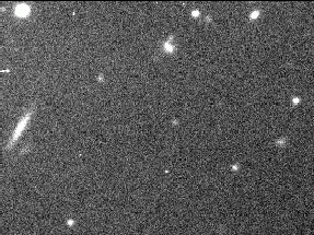 image of a satellite moves across the stationary starfield