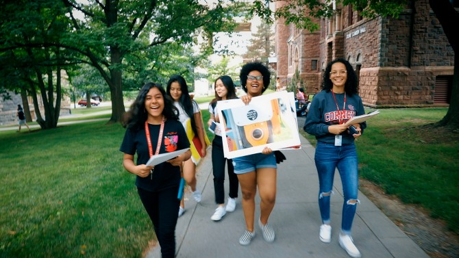 Students with Art Walking on Campus