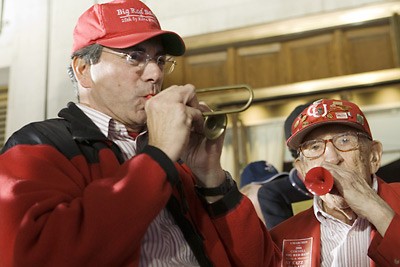Sy Katz's son, Bob Katz '69, left, and Bill Vanneman '31 play a kazoo