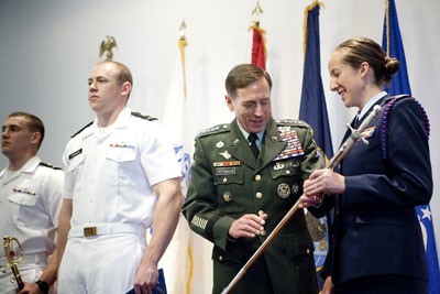 U.S. Army Gen. David Petraeus congratulates Olivia Lawson '10 for winning an award at the ROTC tri-service brigade ceremony for outstanding seniors