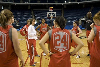 Coach Dayna Smith talks with the team