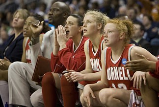 Cornell basketball with coaches