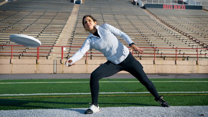 Vivian Zayas throwing Frisbee at Cornell