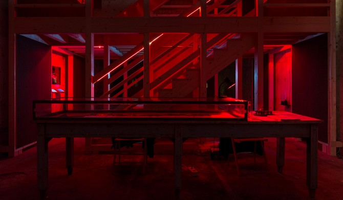 Stairs and banners that appear to be lit with a red light