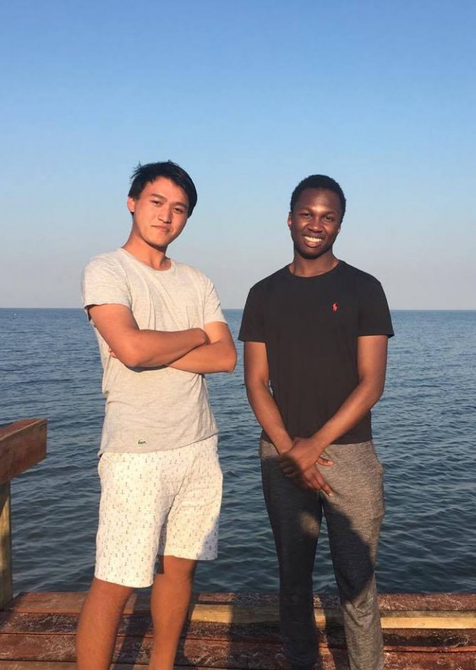 Tony Zhou ’19 with Georges Batoussi ’19 at lake