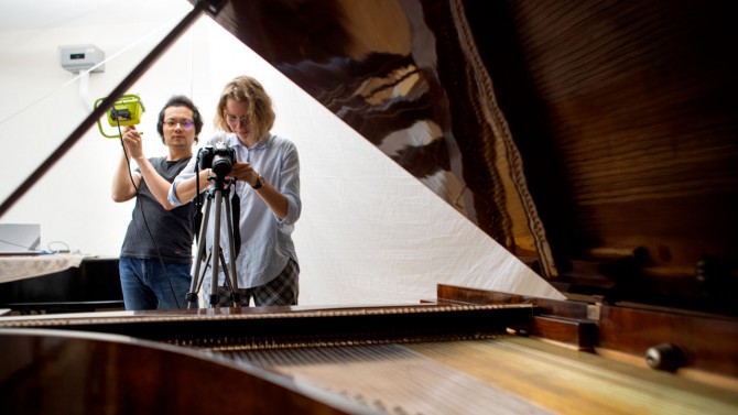 Zabelina and Lee photograph a piano by Joseph Simon 