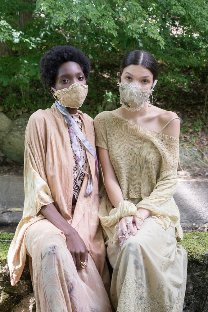 women wearing masks and hand dyed clothing