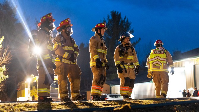 Members of the Varna Volunteer Fire Company participate in a weekly training session.