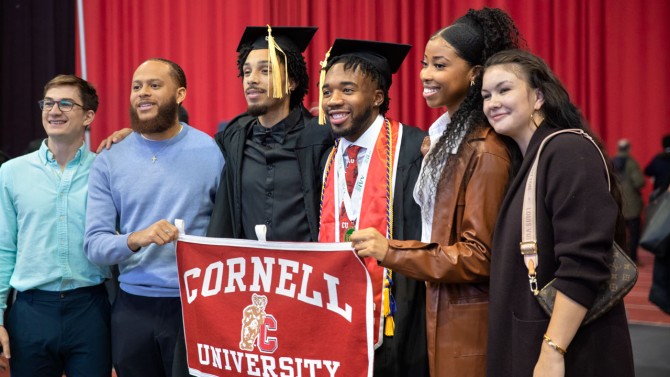 Group holds Cornell banner