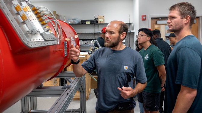 Warrior-Scholar Project students examine Mod-Cam instrument