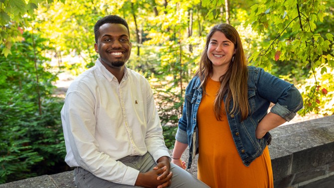 David Epega, left, a peer career coach, and Mia Ferraina, a public service career coach.