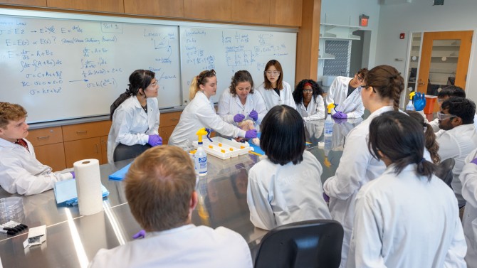 Students gather for a demonstration in a class in 391 Tang Hall.