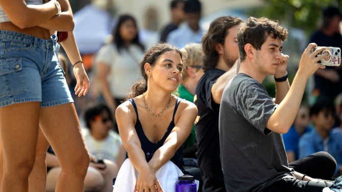 Students enjoy the wide array of downtown outdoor performances.