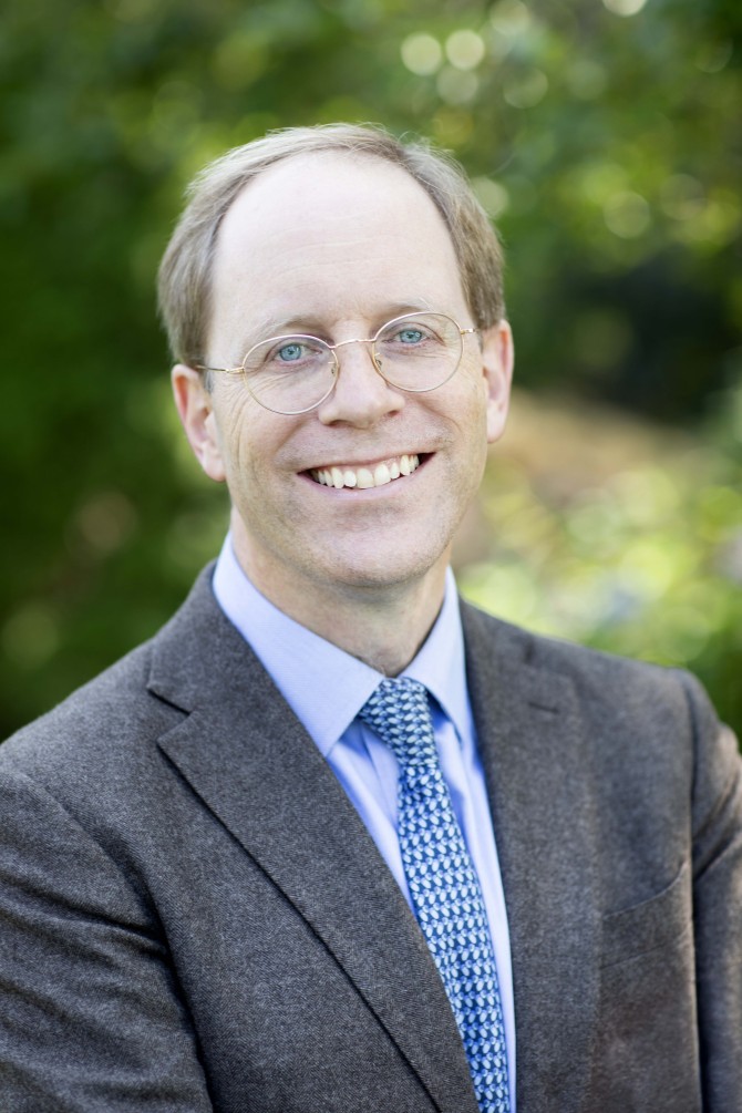 Professor Tim Riley, blond man with glasses