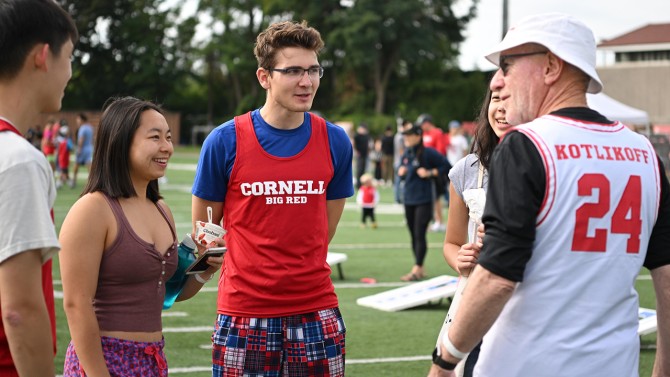 Cornell University Interim President Michael Kotlikoff socializes with students.