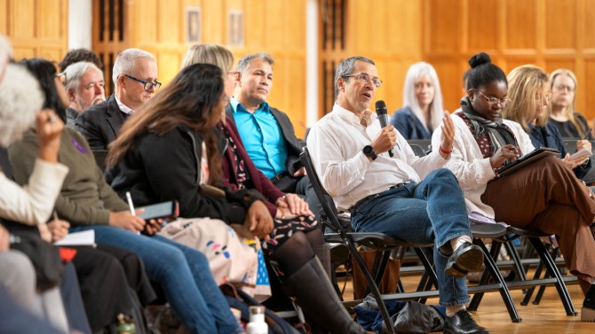 Audience members at a fireside chat with Dr. Robert M. Califf, commissioner of the U.S. Food and Drug Administration, held Oct. 16 in Willard Straight Hall.