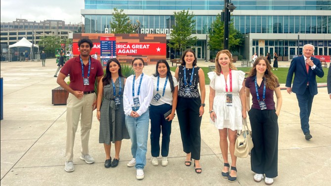 Students from the Cornell Jeb E. Brooks School of Public Policy, with Erin King Sweeney (second from right), senior associate director of the Institute of Politics and Global Affairs, outside the Republican National Convention in Milwaukee this summer.