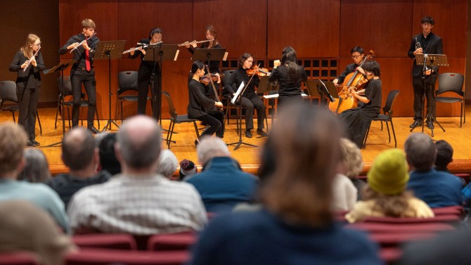 In Call Auditorium on Nov. 9, Cornell Orchestra members perform the introduction to composer Charles Ives’ “The Unanswered Question” during “Carl Sagan’s 90th Birthday: A Celebration,” part of the College of Arts and Sciences’ Arts Unplugged series.