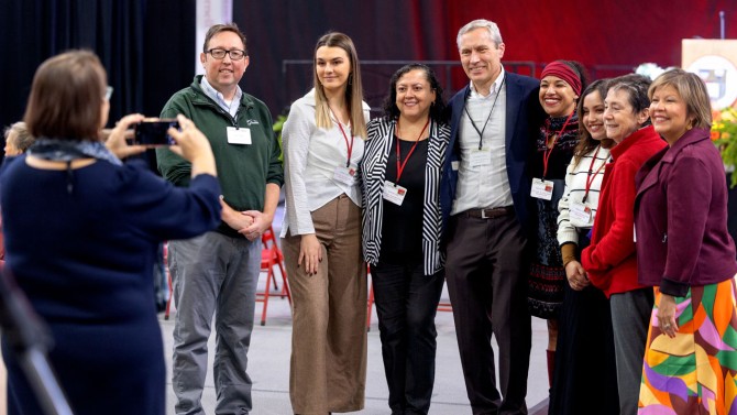 A group of employees pose with Alexander Colvin, Ph.D. ’99, (center) the Kenneth F. Kahn ’69 Dean of the ILR School, at the Employee Excellence Awards ceremony.