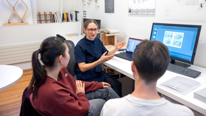 As an Einhorn Center Engaged Faculty Fellow this year, Hanna Tulis, center, is part of a multidisciplinary Cornell team supporting Enfield Food Distribution. She is working with students to propose designs for a new community resource hub on a new site.