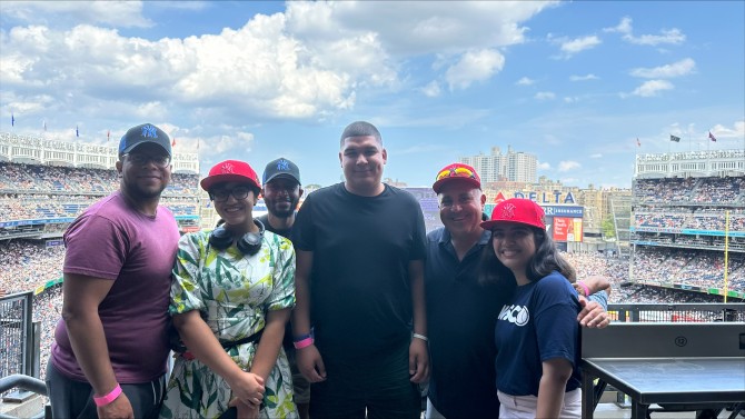 six people at a baseball game