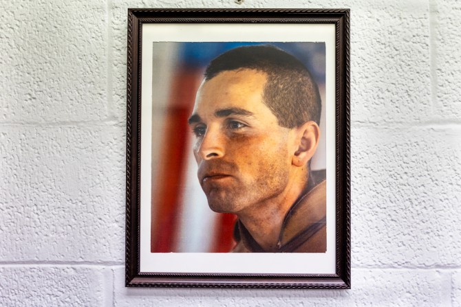 The Gannon Room in Barton Hall is dedicated to the memory of U.S. Marine Maj. Richard J. Gannon II '95, who was killed in Iraq in 2004. The original photo by Andrew Cutraro shows Gannon addressing his Marines days before his death.