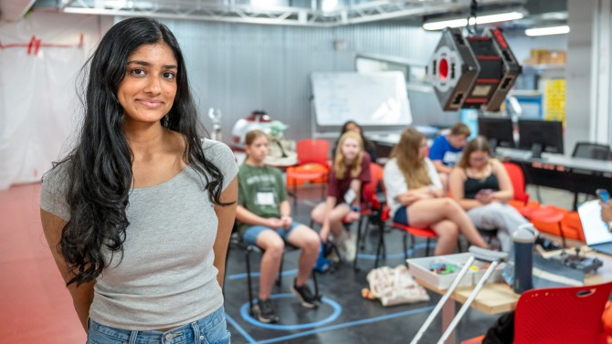 Surabhi Bachhav ’28, a  computer science major in the College of Engineering, helped lead a session for 4-H youth on using robotics to grow plants. 