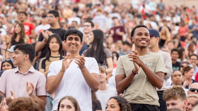 Students applaud at New Student Convocation.