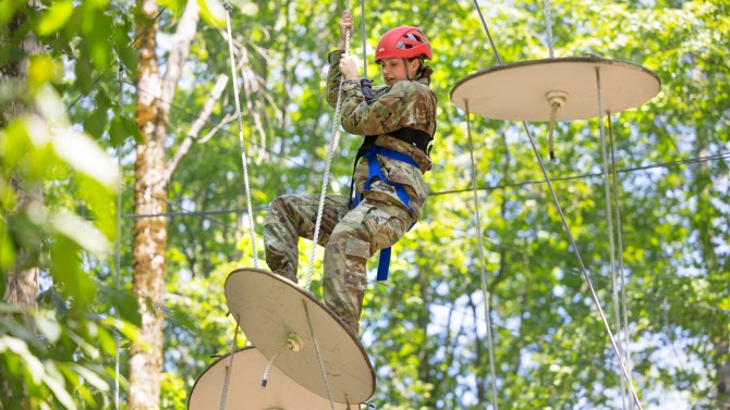 The incoming class of Army ROTC students engage in team building skills at Hoffman Challenge Course.