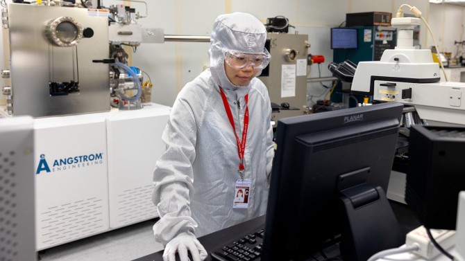 Postdoctoral researcher Ying Yang works in the CNF cleanroom in Duffield Hall.