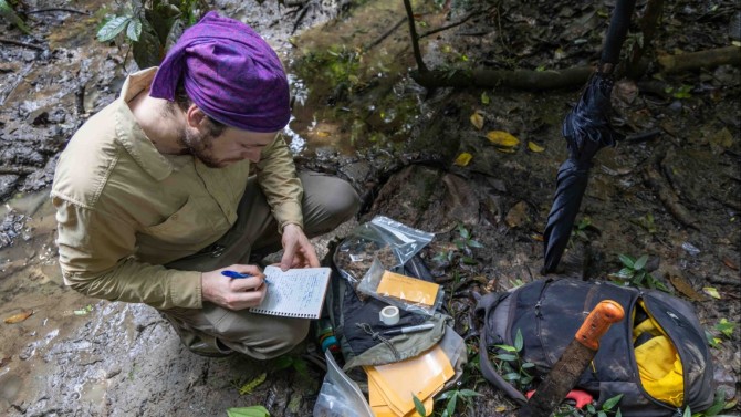 Ethan Duvall doing fieldwork