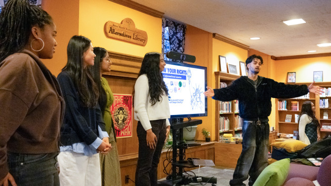 Hasham Ali (right) and other student leaders from the Asian Pacific Americans for Action, Black&nbsp;Students United, the Organization for Afghan&nbsp;Students and the South Asian Council hosting a Know Your Rights presentation at the Durland Alternatives Library in November.