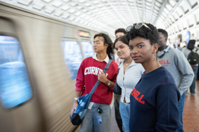 DC Start Scholars wait for a train in the Washington D.C. metro tunnel