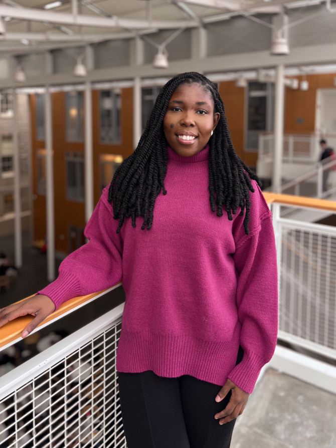 person standing by railing 