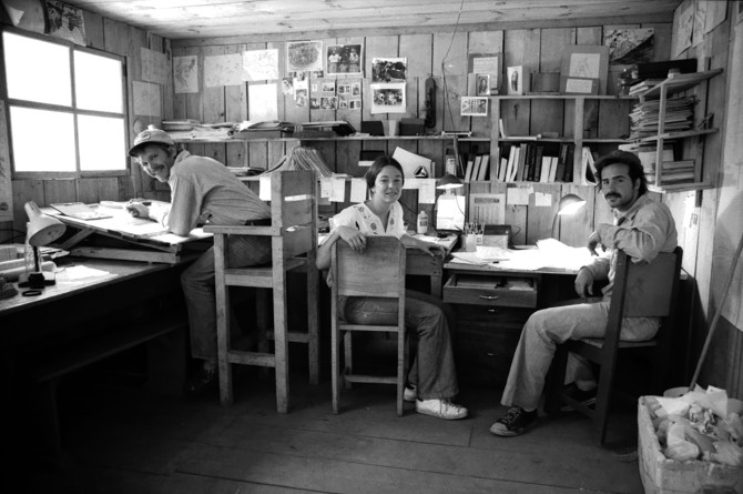 three people in an office
