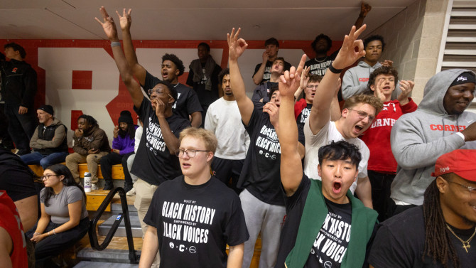 The student sections cheers on the Big Red at Newman Arena.