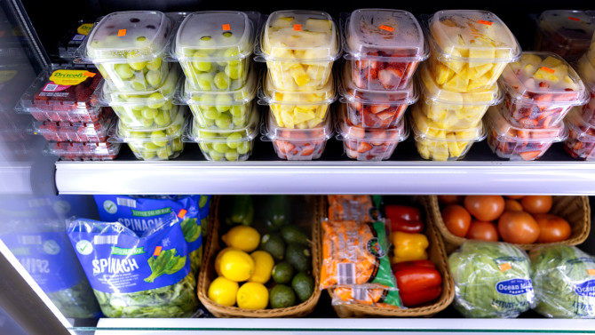 A cooler at Buffalo's Golden Corner store stocks fresh fruits and vegetables. The store participates in CCE Erie's Healthy Community Store Initiative.