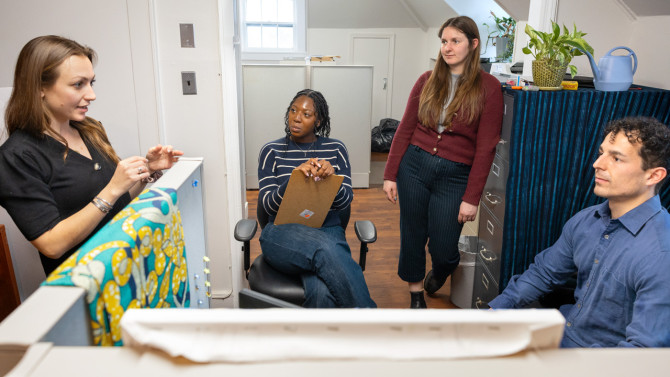 Fabiani discusses work with her colleagues at the Cornell Cooperative Extension Nassau County office in East Meadow, New York. From left to right: Fabiani; Jaiden Fox, communications and event coordinator; Faith Laudano, associate hub director; and Chad Marvin, clean energy workforce development manager.