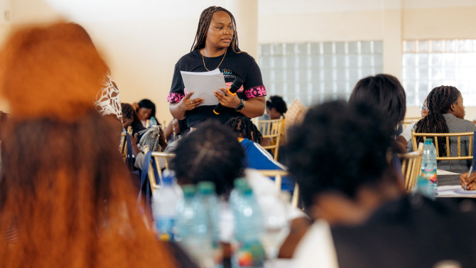 Doctoral student Cátia Dombaxe facilitates an EducateHer workshop in Angola, where STEAMpact delivered training on women’s health, reproductive health and financial literacy.