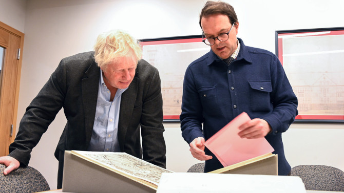 Laurent Ferri (right), curator of pre-1800 collections at Cornell University Library’s Rare and Manuscript Collections, presented Boris Johnson a few invaluable volumes related to Rome, including Giovanni Battista Nolli’s Pianta Grande di Roma, a book of engravings mapping out the city, published in 1748.