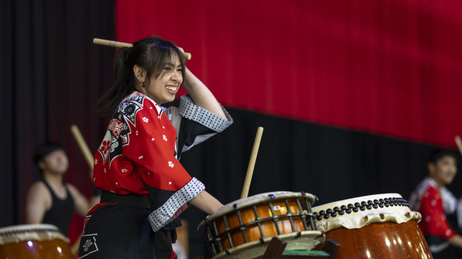 Taiko drum ensemble Yamatai gives a spirited performance during Senior Convocation.