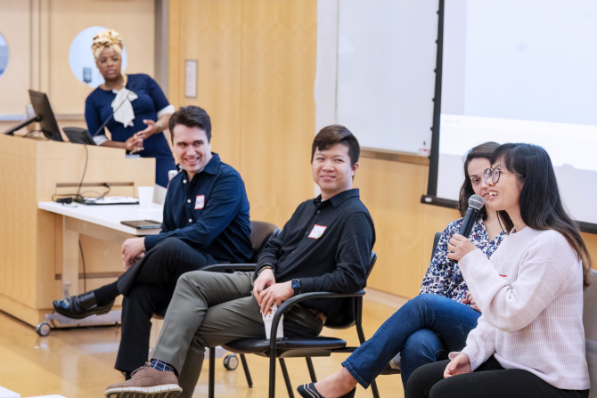 A graduate teaching panel speaks at a conference