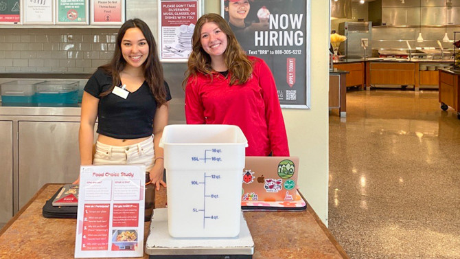 Cornell Dining student sustainability coordinators Noa Dijstelbloem '25 (left) and Ellie Butkovich '26 (right) spent hours surveying peers about their food waste.