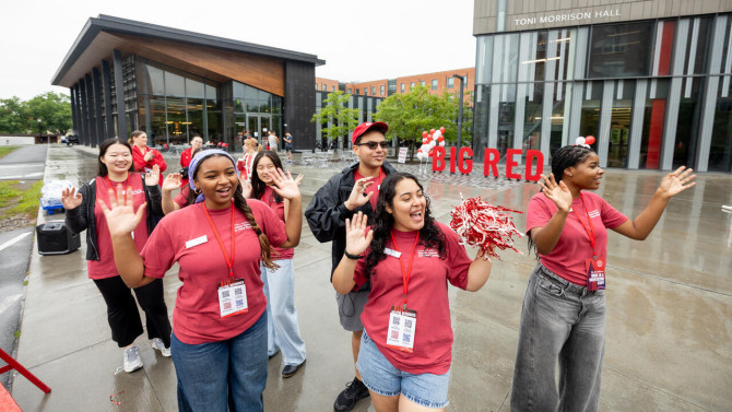 Returning Cornell students set up outside Morrison Hall to help new students move in.