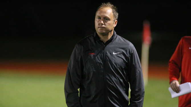 John Smith, the Dr. Daniel P. Wood Head Coach of Men’s Soccer, paces the sidelines during a home contest at Berman Field during the 2024 campaign.