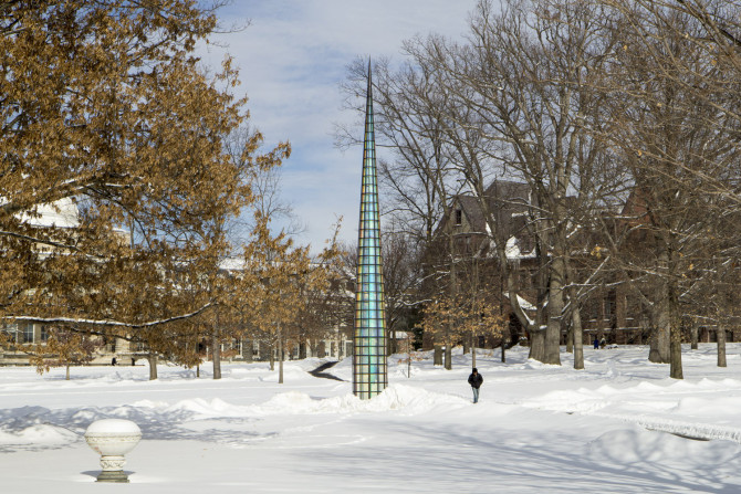 needle-like sculpture on the Arts Quad in snow