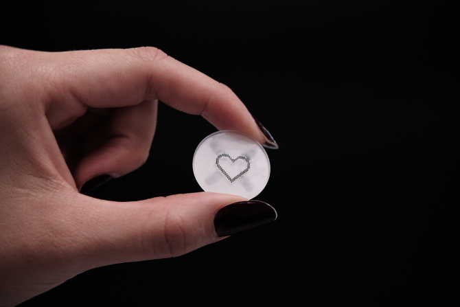 small heart in a plastic circle
