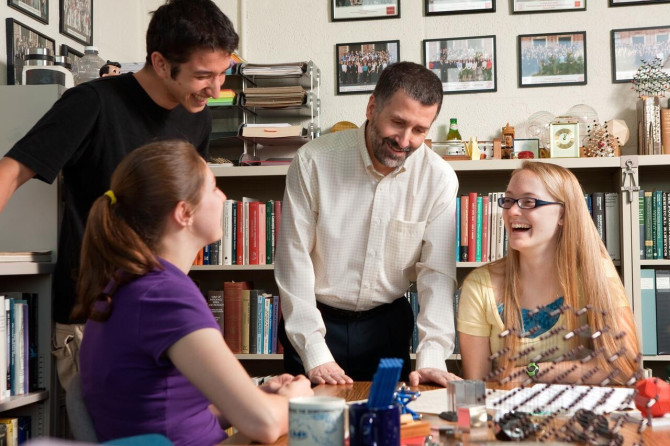 professor with three students