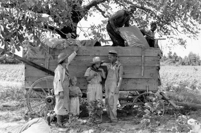 A photo of cotton farmers in Arkansas in 1937, part of a series of photographs by Louise Boyle, who documented the living and working conditions of members of the Southern Tenant Farmers Union.