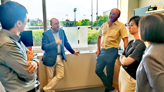 The Pleryon team visited the lab of Lawrence Bonassar (center, in blazer) in 2024 to discuss the technology and applications around lubricin, a slippery glycoprotein that they are using in two human trials, for dry eye and osteoarthritis.